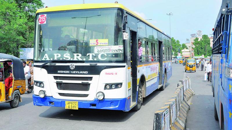 A few RTC buses have stickers stating that the minimum fare was reduced to 5 in Guntur on Wednesday. (Photo: DC)
