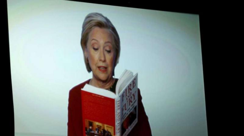 Clinton, who lost the 2016 election to Trump, read an excerpt from the book about Trumps eating habits. (Photo: AP)