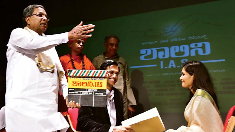 CM Siddaramaiah claps for Kannada movie, Shalini IAS, during its shooting in Bengaluru on Saturday (Photo: DC)