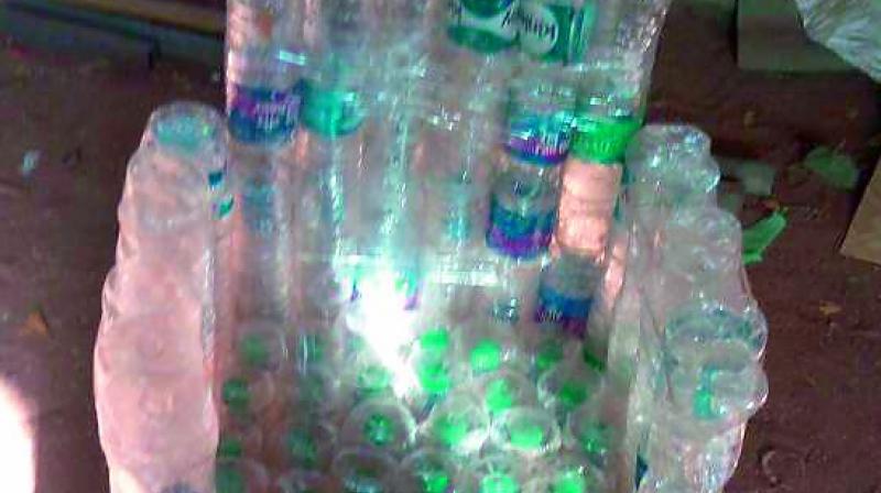 Chair made with PET bottles to be donated to government schools. (Photo: DC)