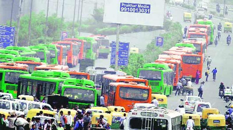 A majority of drivers and conductors of orange cluster buses have been protesting for the last six days against non-payment of their salary as per the new rates of minimum wages. (Photo: PTI)