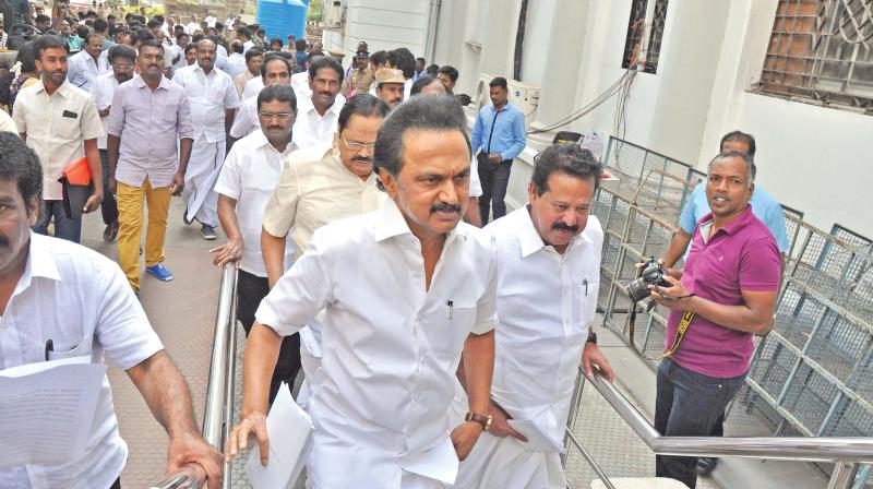 DMKs working president M.K. Stalin with party legislators arrives at the Assembly on Monday.	(Photo: DC)