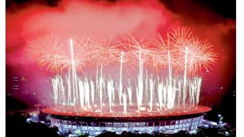 Fireworks explode over the Gelora Bung Karno Stadium at the closing ceremony of the Asian Games in Jakarta on Sunday.  (Photo:AFP)