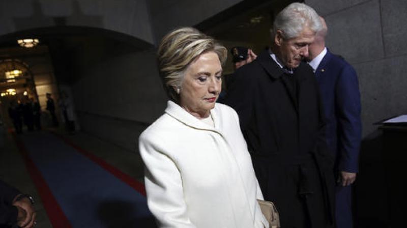 Former Sen. Hillary Clinton and former President Bill Clinton arrive on the West Front of the U.S. Capitol on Friday, Jan. 20, 2017, in Washington, for the inauguration ceremony of Donald J. Trump as the 45th president of the United States. (Photo: AP)