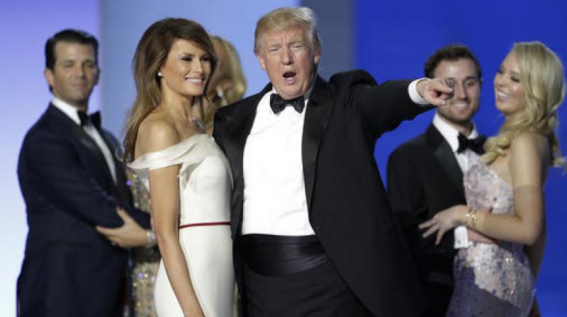 President Donald Trump acknowledges the crowd at the Freedom Ball in Washington at the Washington Convention Center during the 58th presidential inauguration. (Photo: AP)