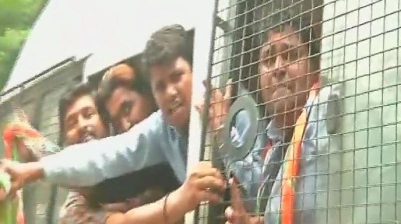 Congress holds protest against attack on Rahul Gandhis convoy, protesters detained in Mumbai. (Photo: ANI | Twitter)