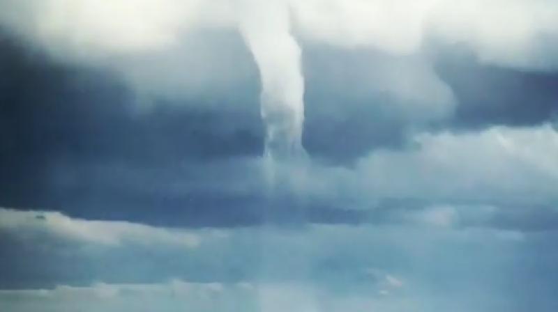 The footage shows the waterspout just beginning to form over the sea before it ravaged the city. (Photo: Instagram/Rudi G.)