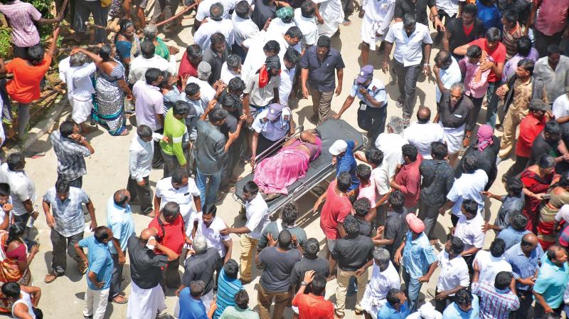 People gather in large numbers to pay their last respects to DMK patriarch