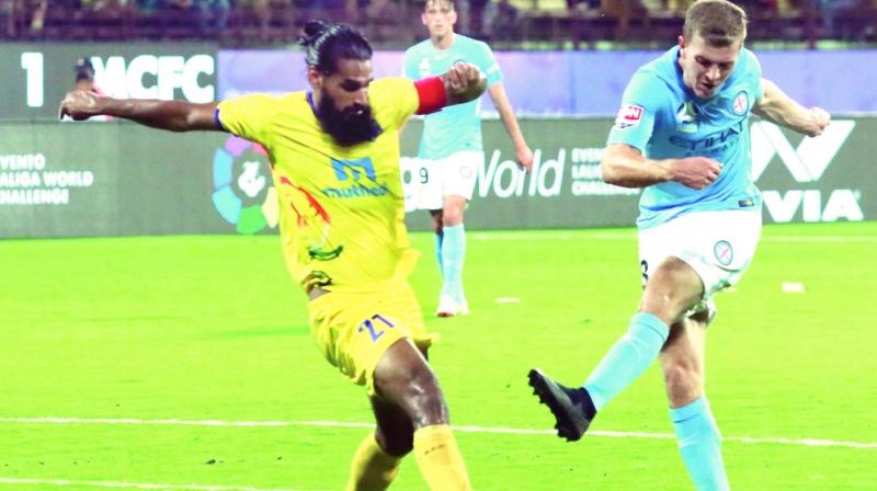 Melbourne City FCs Biley McGree (right) scores against Kerala Blasters in Kochi on Tuesday. MCFC won 6-0. (Photo: Arun Chandrabose)