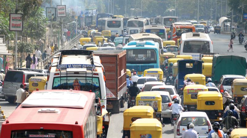 Traffic and pollution in Bengaluru which will soon be like that of Delhi if something is not done soon.