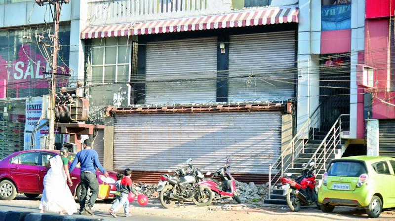 Shutters down on a shop at Karkhana which was once a reputed bakery with branches across the city. After it shifted out, there have been no takers for the space. (Photo: DC)