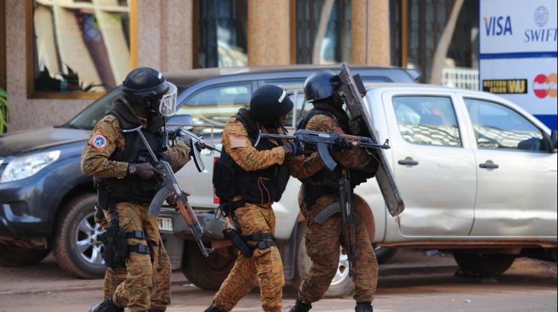 Security forces arrived at the scene with armored vehicles after reports of shots fired near Aziz Istanbul, an upscale restaurant in Ouagadougou. (Photo: AFP)