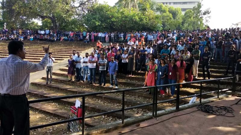 Techies gather at the assembly point during a mock fire drill session. 	(File pic)