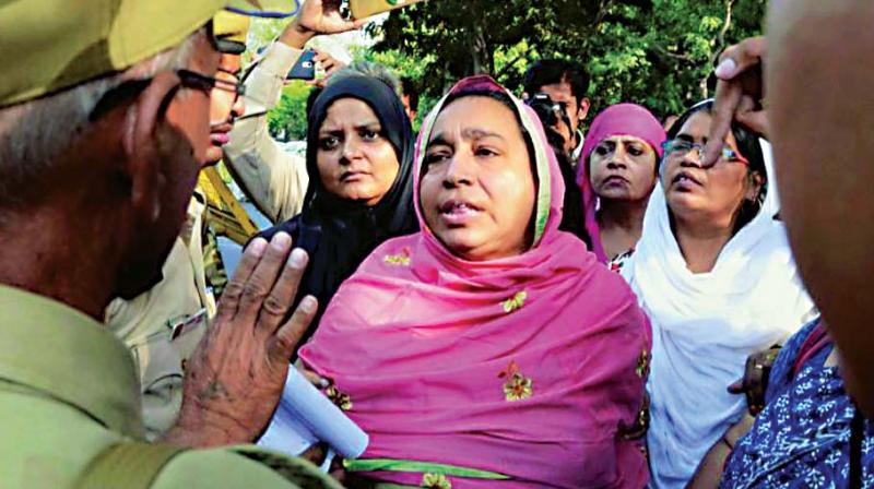 A file photo of Najeeb Ahmads mother, Fatima Nafees at a protest in New Delhi