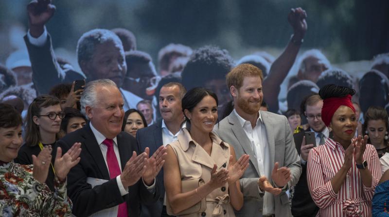 Britains Prince Harry, second right, and Meghan the Duchess of Sussex attend the launch of the Nelson Mandela Centenary Exhibition, marking the 100th anniversary of anti-apartheid leaders birth, at the Queen Elizabeth Hall in London, Tuesday, July 17, 2018. (Photo: AP)