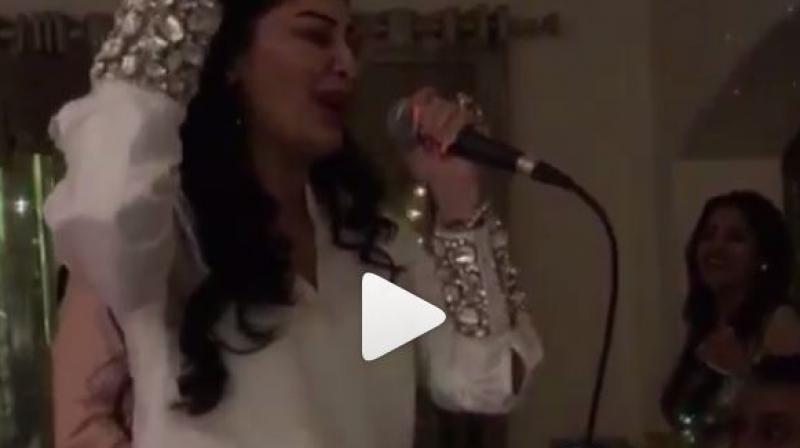 A screenshot from the video of Sanjay Dutt and Maanyata.