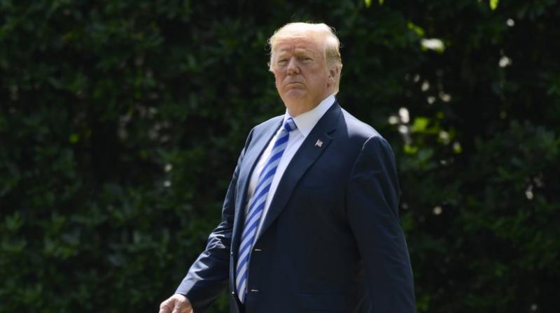 In this June 1, 2018, photo, President Donald Trump walks to Marine One on the South Lawn of the White House in Washington, as he heads to Camp David for the weekend. Lawyers for President Donald Trump and Summer Zervos, a former  Apprentice  contestant who sued the president for saying her sexual misconduct claims were lies, are scheduled to be in court Tuesday, June 5, 2018, in New York. (AP Photo/Susan Walsh)