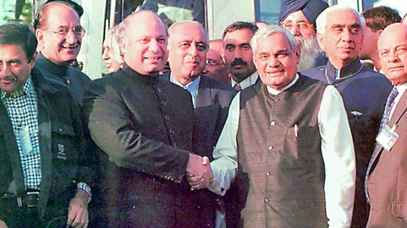 Vajpayee shakes hands with then Pakistan PM Nawaz Sharif after his famous Lahore Bus Yatra.