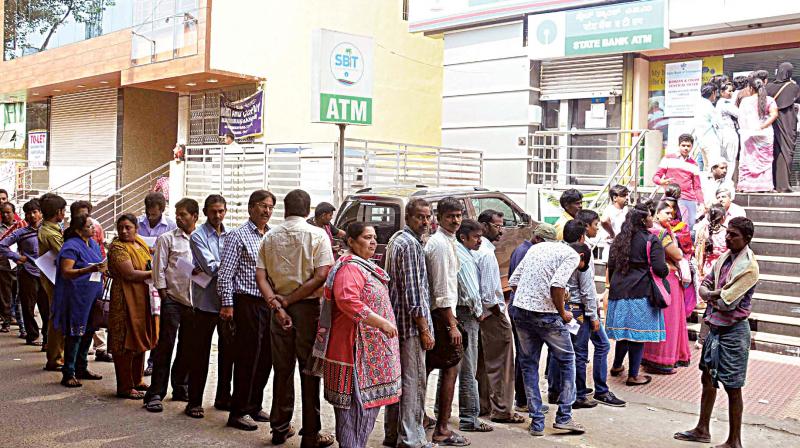 While bank officials claim they are working overtime to ensure that all those who need money get it on time,  people forced to stand in long queues continue to blame them for not filling up all their ATMs.