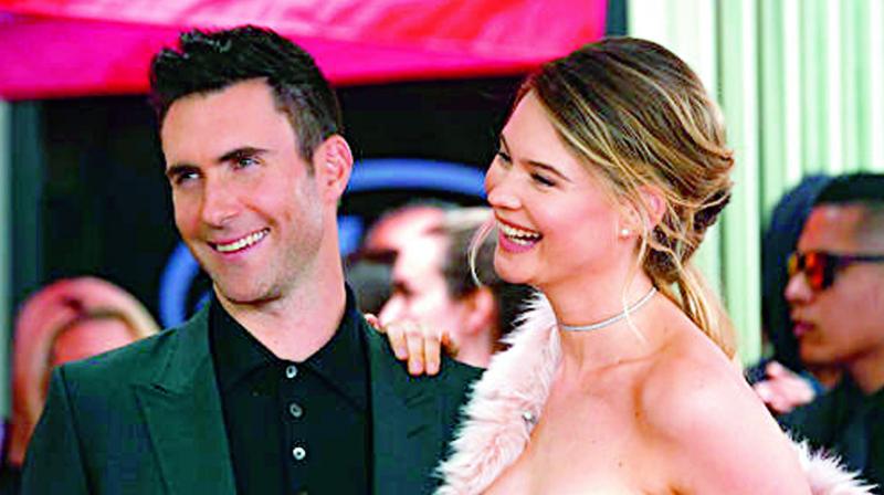 Adam Levine with his wife and model Behati Prinsloo