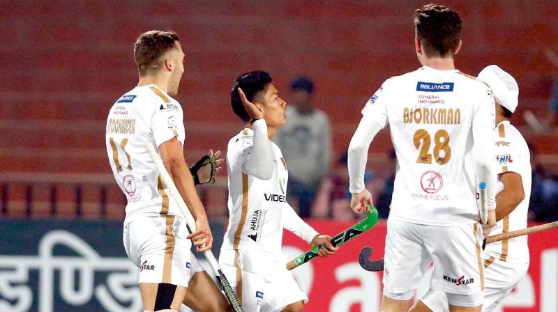 Dabang Mumbai players celebrate their 2-1 win over Jaypee Punjab Warriors in their Hockey India League-5 match in Chandigarh on Saturday.