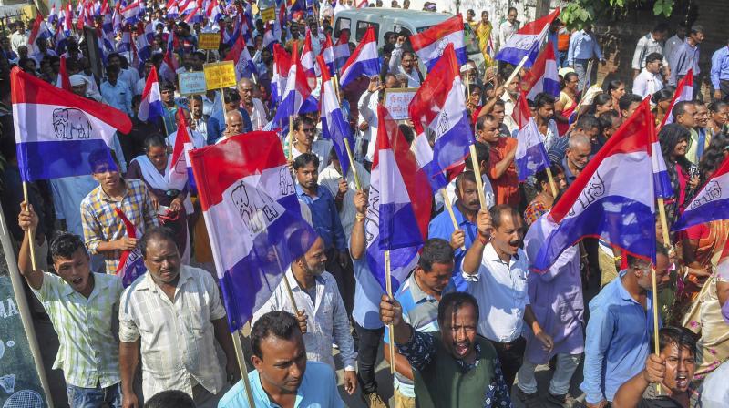 Assom Gana Parisahad (AGP) activists take part in a protest rally during 12-hour Assam Bandh, in Guwahati, on Tuesday. (Photo: PTI)