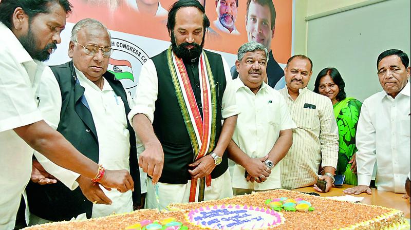 TPCC president N. Uttam Kumar Reddy and other Congress leaders celebrate the birth day of Sonia Gandhi at Gandhi Bhavan on Sunday. (Photo: S. Surender Reddy)