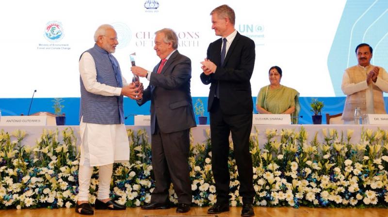 PM Modi was selected in the leadership category for his pioneering work in championing the International Solar Alliance and for his unprecedented pledge to eliminate all single-use plastic in India by 2022. (Photo:@antonioguterres | Twitter)