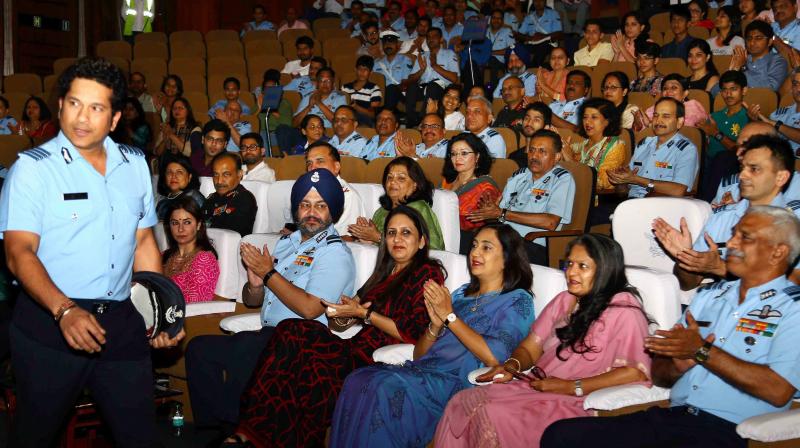 At the special screening of Sachin A Billion Dreams held for Indian Armed Forces, Honorary Group Captain Sachin Tendulkar was joined by Air Chief Marshal BS Dhanoa along with personnel and their families from Indian Air Force, Indian Army and Indian Navy. (Photo: PTI)