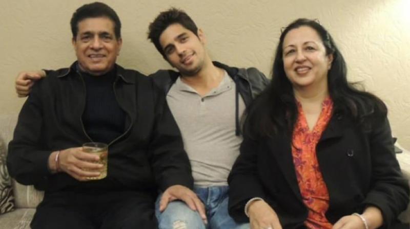 Sidharth Malhotra with his parents
