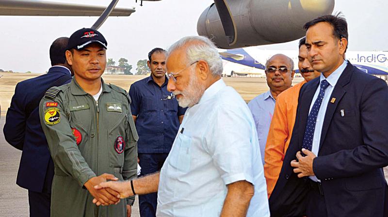 Prime Minister Narendra Modi at the Mangaluru International Airport from where he left for Lakshadweep on Tuesday .	 KPN
