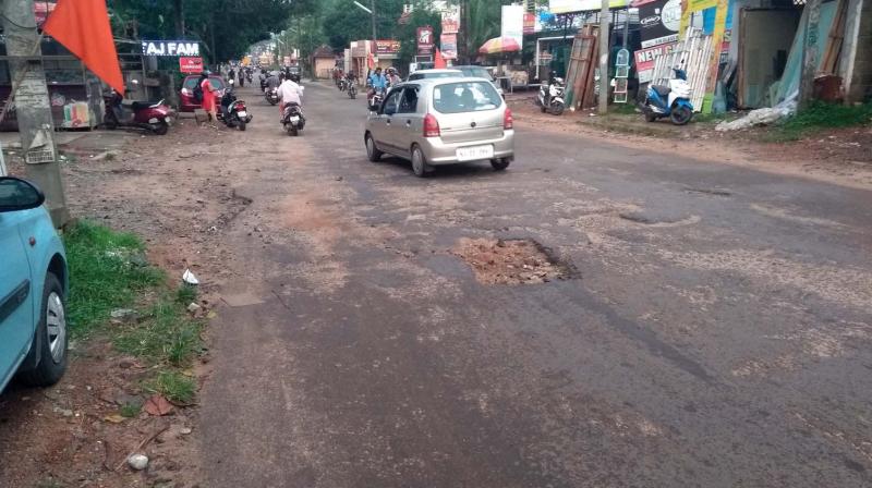 Potholes in Thirumala-Peyad road	        Image: DC