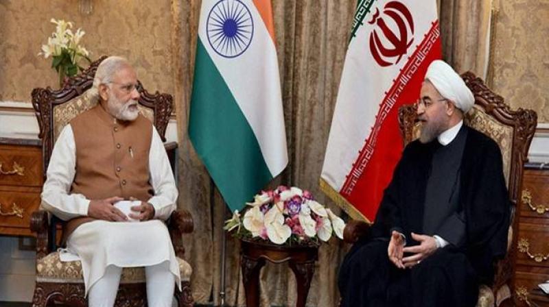 Prime Minister Narendra Modi with his Iranian counterpart Hassan Rouhani. (Photo: PTI)