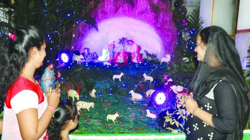 Youngsters attending mass at St Josephss Church in Nellore on Monday as part of Christmas celebrations. (Photo: DC)