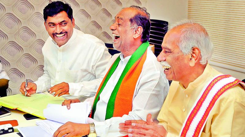 TS BJP president K. Laxman chairs a meeting of the partys election committee at the party office at Nampally in Hyderabad on Friday. (Photo:P. Surendra)