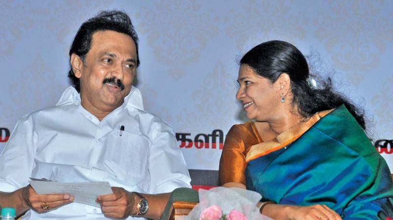 Working secretary of DMK, M.K. Stalin, interacts with his sister and Lok Sabha MP, Kanimozhi, during the Womens day celebration at Anna Arivalayam. (Photo: DC)