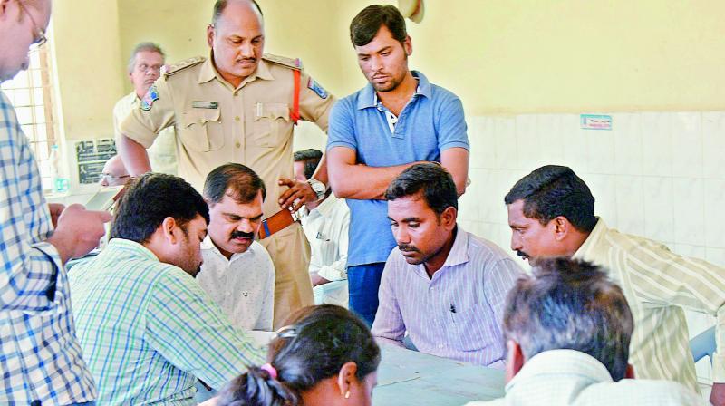 Officials record the statement of Narsimha, the brother of Akkineni Ganesh, who died on Friday. (Photo: DC)