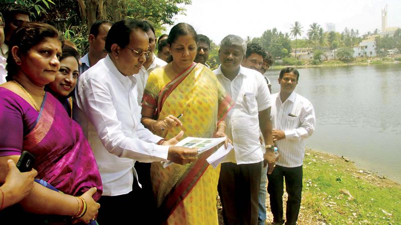 Union Minister for Commerce and Industry Nirmala Sitharaman meets the residents near Kalena Agrahara Lake in Bengaluru on Saturday