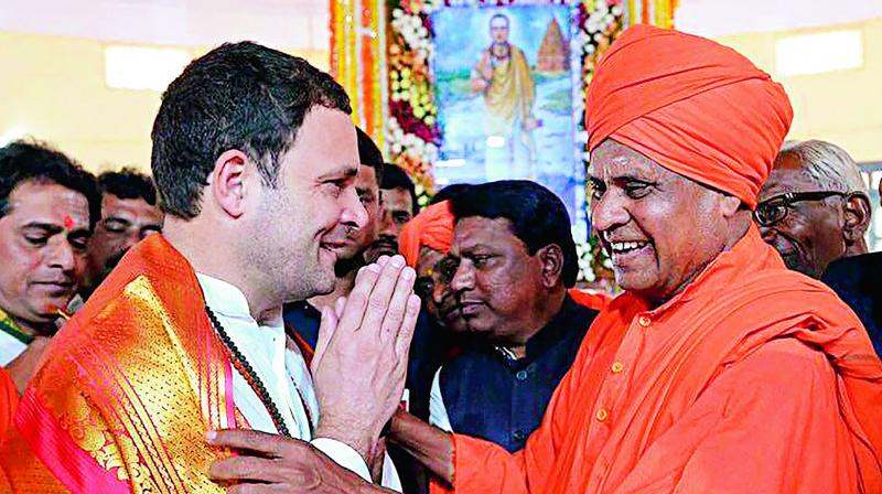 Congress president Rahul Gandhi with the saints at Anubhava Mantapa in Karnataka on Tuesday. (Photo: PTI)