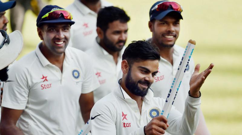 While Virat Kohli moved to second spot in ICC Test rankings following his brilliant batting performance against England in Mumbai Test, R Ashwin consolidated his position at top bowlers rankings following his 12-wicket haul in the Mumbai Test. (Photo: PTI)