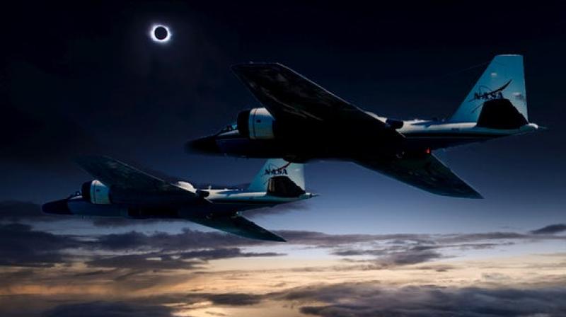 (Photo illustration) During the upcoming total solar eclipse, a team of NASA-funded scientists will observe the solar corona using stabilized telescopes aboard two of NASAs WB-57F research aircraft. This vantage point provides distinct advantages over ground-based observations, as illustrated by this composite photo of the aircraft and the 2015 total solar eclipse at the Faroe Islands. Credits: NASA/Faroe Islands/SwRI
