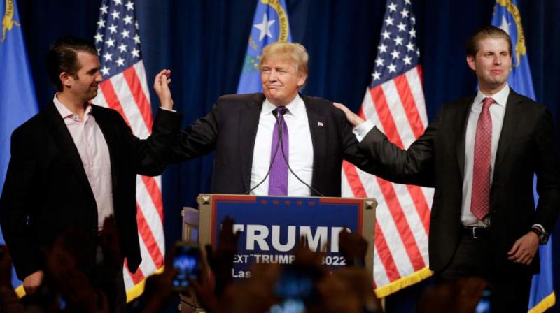 Donald Trump with his sons Donald Trump Jr. and Eric in Las Vegas. (Photo: AP)