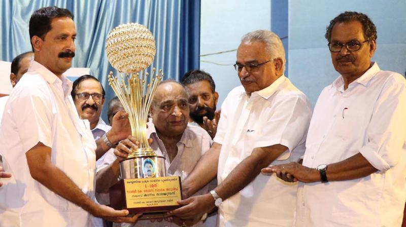M. P. Veerendra Kumar  presents Sandra K. Thomas Award to CPI state  secretary Kanam Rajendran in Thrissur on Saturday (Photo: ANUP K. VENU)