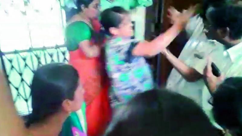 A video grab shows Mr Achyut Rao being attacked.