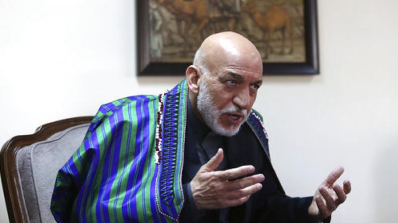 Former Afghan President Hamid Karzai speaks during an interview with the Associated Press in Kabul, Afghanistan. (Photo:AP)