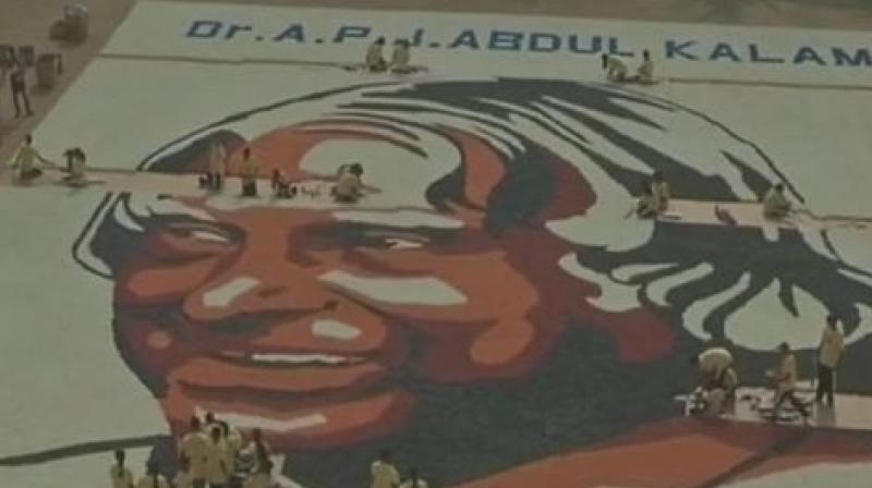 Students attempt Guinness world record by creating largest disposable paper cup mosaic of late President APJ Abdul Kalam. (Photo: ANI/Twitter)