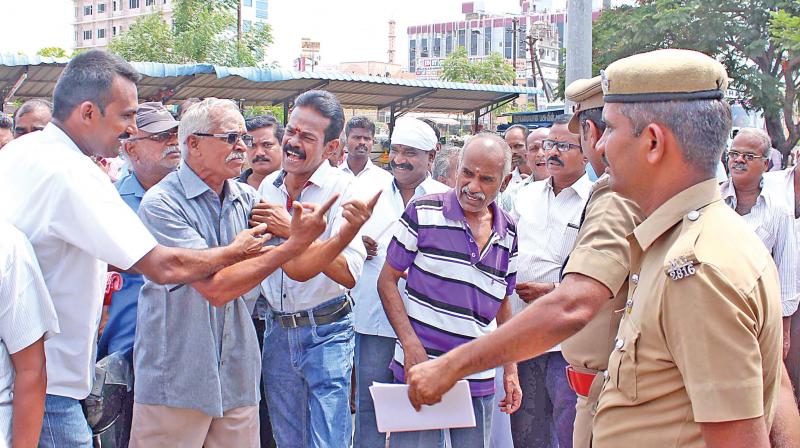 Trade union workers staged protest during the second day of the bus strike at Mattuthavani bus stand in Madurai on Tuesday. (Photo: DC)