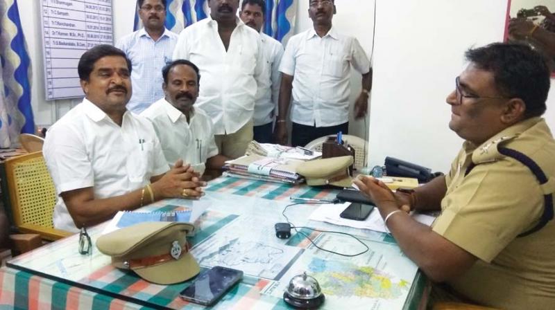 MLA V.C. Arukutty being questioned at the Attur police station in Salem in connection with the Kodanad break-in ion Tuesday. (Photo: DC)