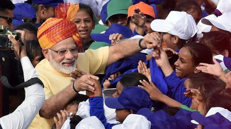 Prime Minister Narendra Modi interacting with the school children after addressing the nation on the occasion of 71st Independence Day in New Delhi on Tuesday. (Photo: PTI)