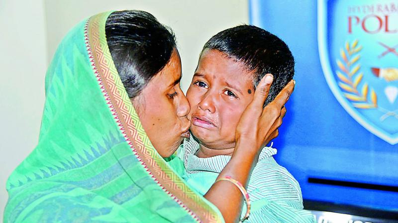 Ms Sanju Chamar and her son Ayush, who was kidnapped from Seunderabad railway station a day ago, break down after they were reunited by police.